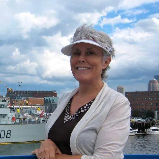 Senior woman smiling by the waterfront. Senior woman smiling by the waterfront.